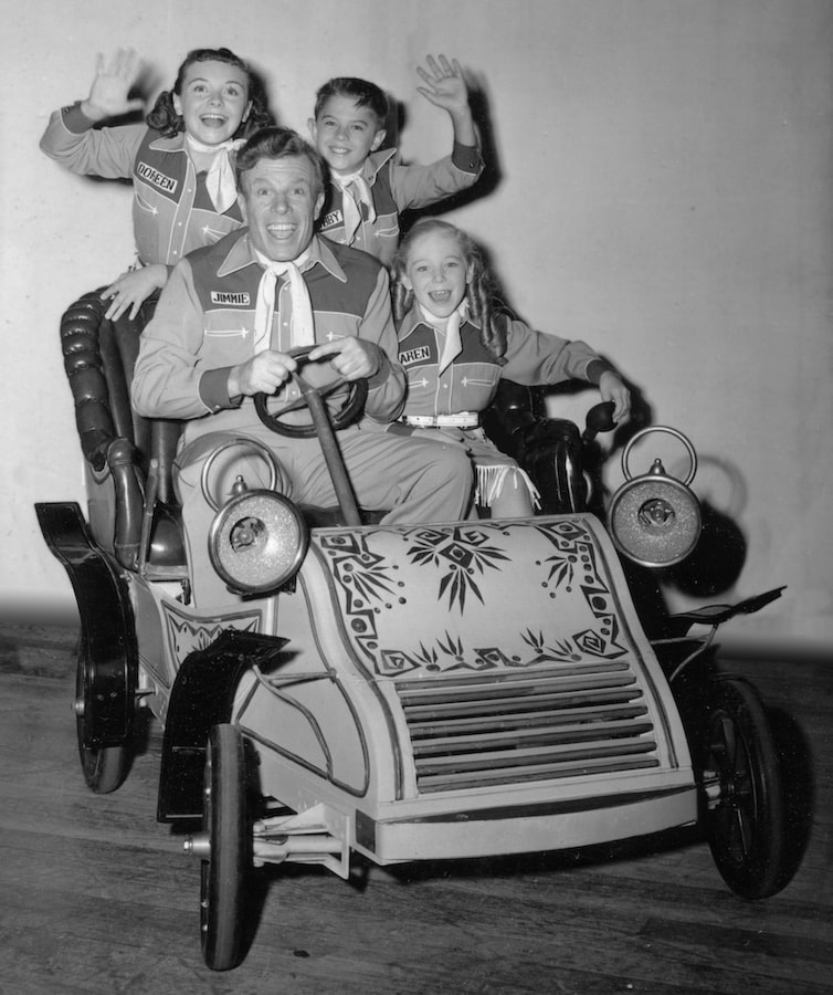 Jimmie Dodd, Doreen Tracey, Karen Pendleton and Cubby O'Brien are off for an adventure--courtesy of Mr. Toad!