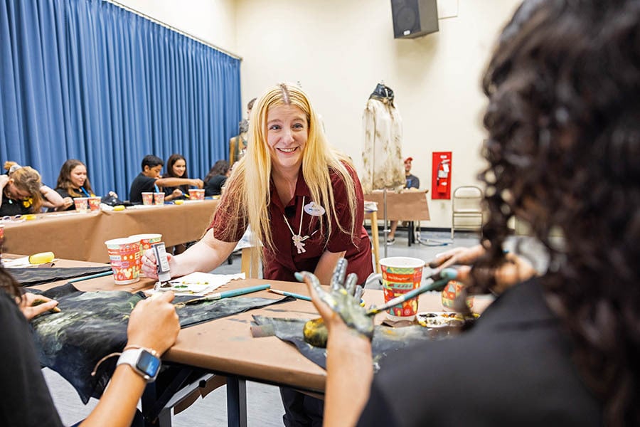 Disney Cast Member Teaching Florida Theater Students about Costuming
