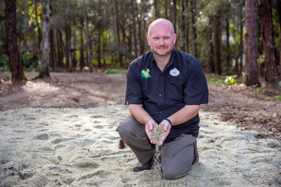 Cast member with glass that has been turned into sand-like material