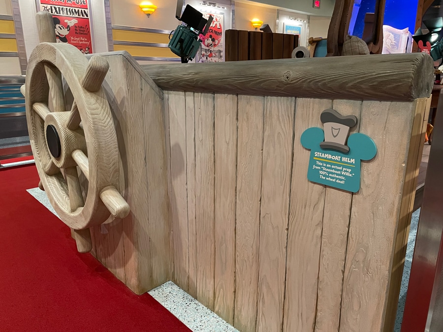 Steamboat Willie boat helm prop inside the queue for Mickey and Minnie's Runaway Railway at Disneyland Park located at Mickey's Toontown
