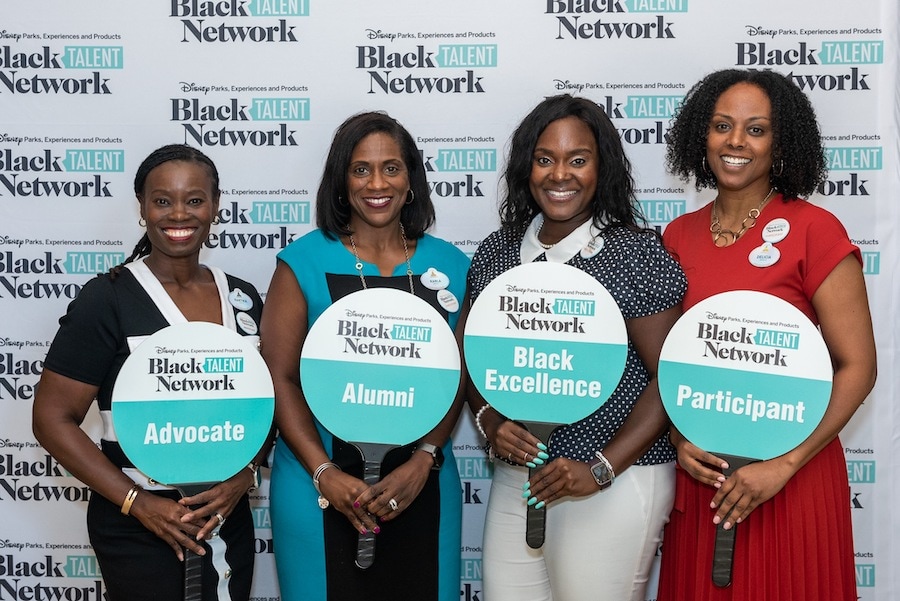 Kartika Rodriguez, VP – EPCOT, with cast members