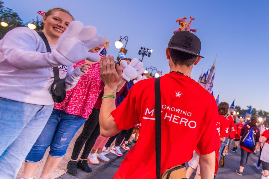 Families and Disney VoluntEARS in Magic Kingdom Park
