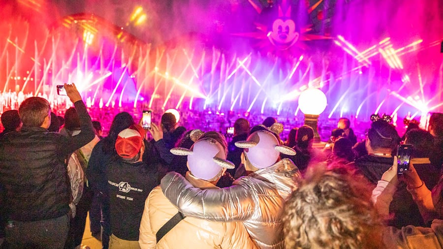 Cast members watch a performance of World of Color - ONE
