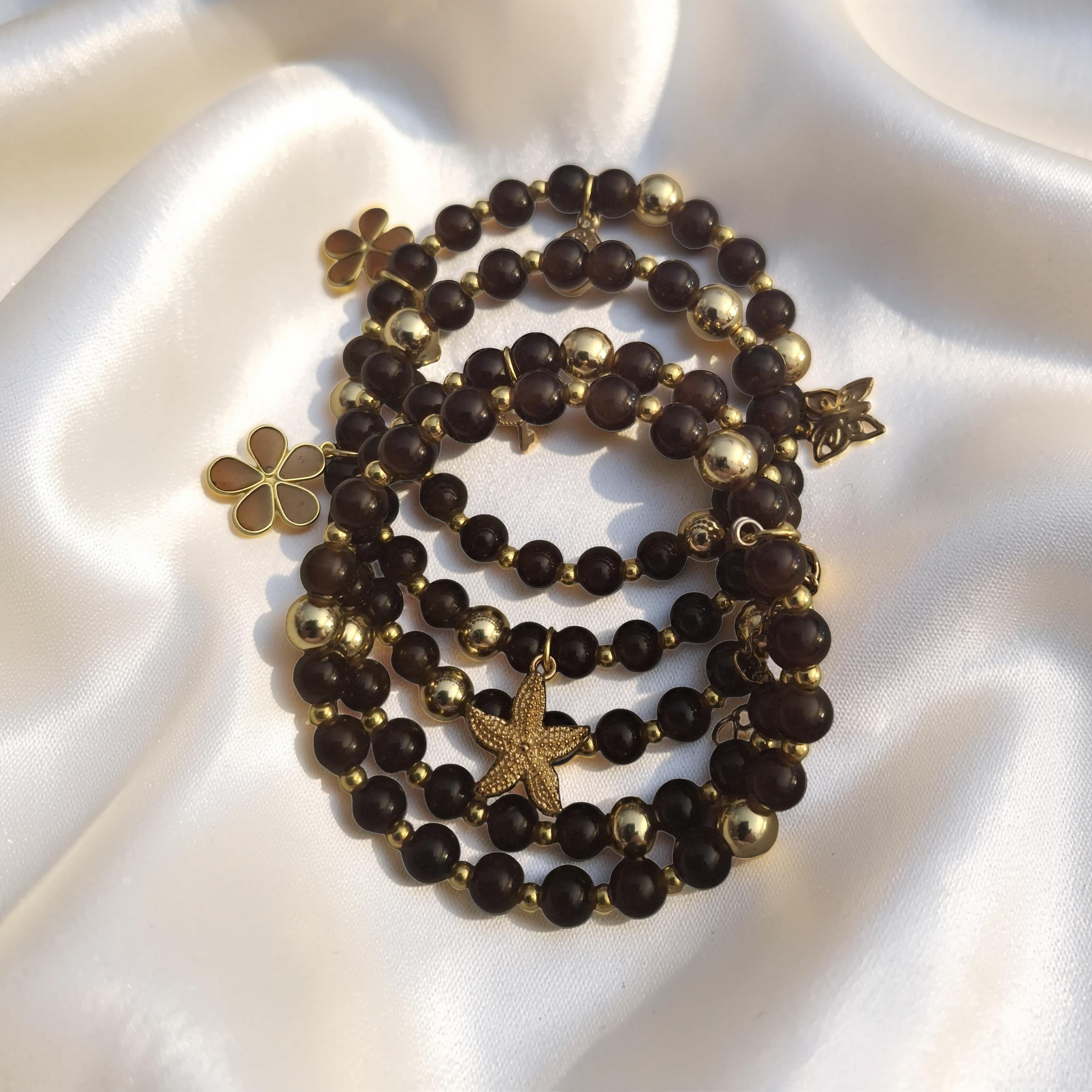 Earthbound Gold Charm Bracelet and earring set