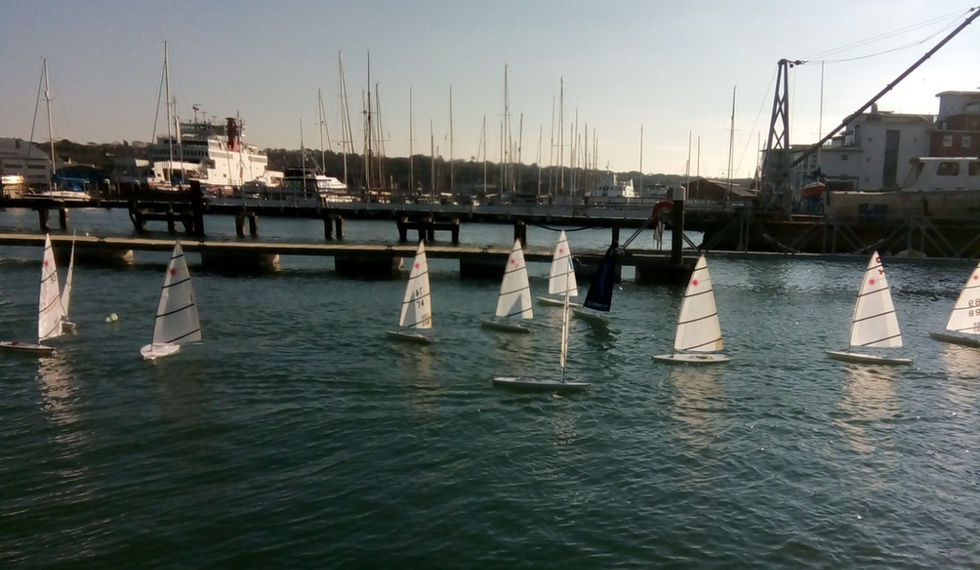RC Lasers sailing outside the CCYC pontoons