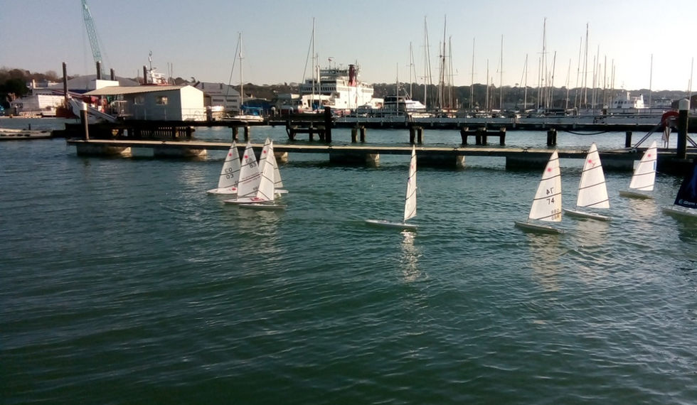 RC Lasers sailing outside the CCYC pontoons