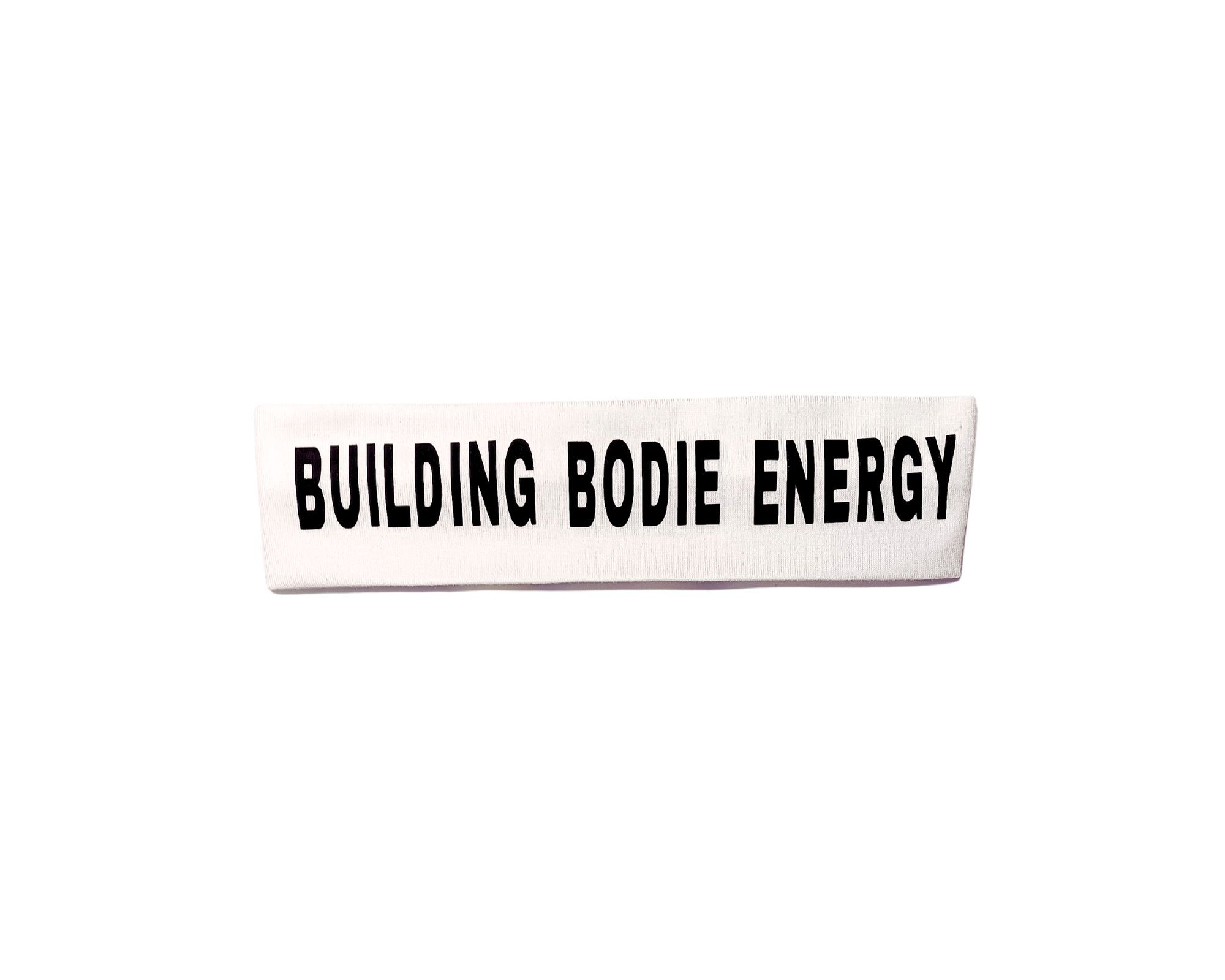 Stretch Non-Slip White Headbands, with Black "Building Bodie Energy" Font Logo.