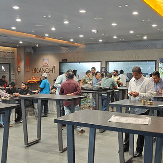 sitting and standing tables in Kanchi Cafe