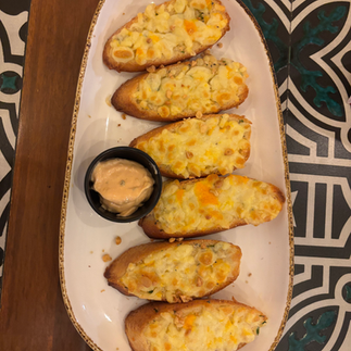 Picture showing the Signature Cheesy garlic Bread
