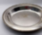 Silverplate platter showing surface wear and natural patina from use