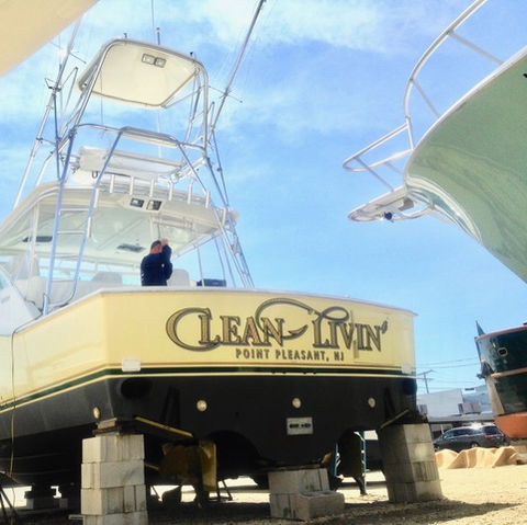 custom boat lettering, boat lettering, transom wrap, woodgrain boat wrap, transom art, boat decals, quality lettering, lettering