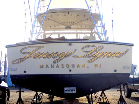 custom boat lettering, boat lettering, transom wrap, woodgrain boat wrap, transom art, boat decals, quality lettering, lettering