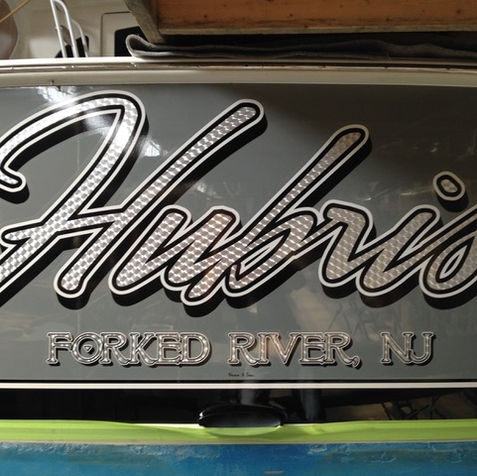 custom boat lettering, boat lettering, transom wrap, woodgrain boat wrap, transom art, boat decals, quality lettering, lettering