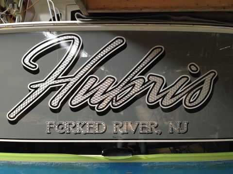 custom boat lettering, boat lettering, transom wrap, woodgrain boat wrap, transom art, boat decals, quality lettering, lettering
