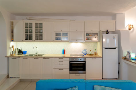 interior real estate photography of villa apartment in Mykonos with sea view at sunset