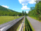 Cycling between the Old Man in the Mountain and Cannon Mountain Aerial Tramway | Franconia Notch Recreational Path