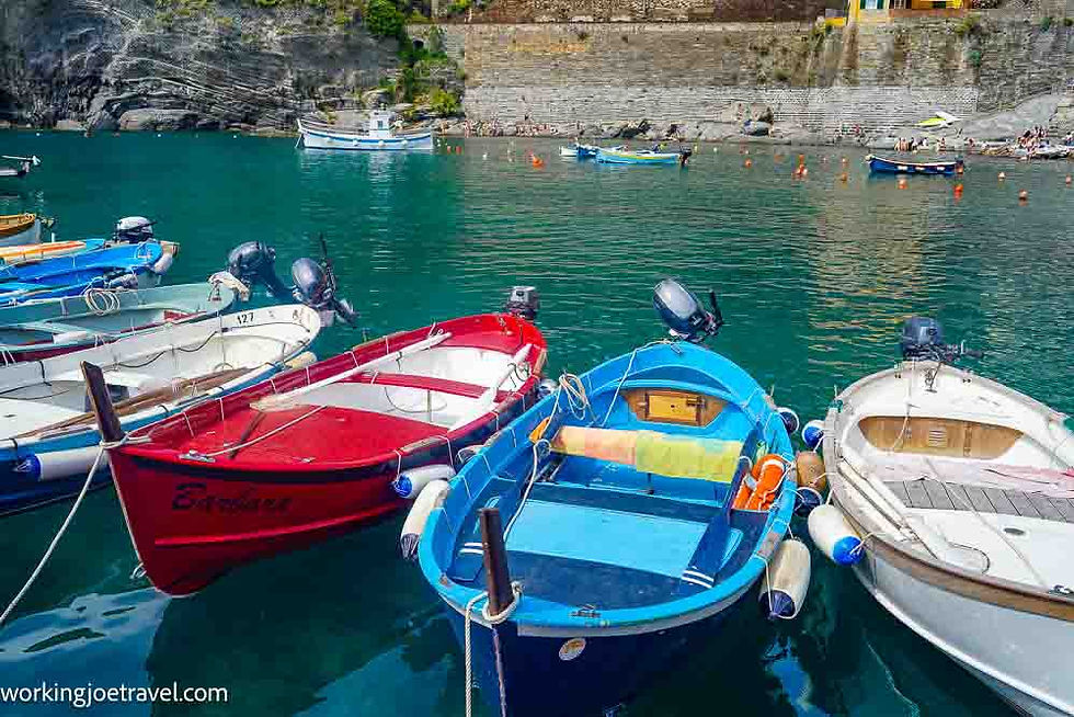 Traditional Gozzi Fishing Boats in Vernazza Italy Harbor