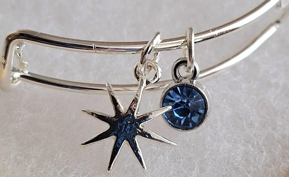 Thumbnail: Falling Flurry Snowflake Charm Bangle Bracelets