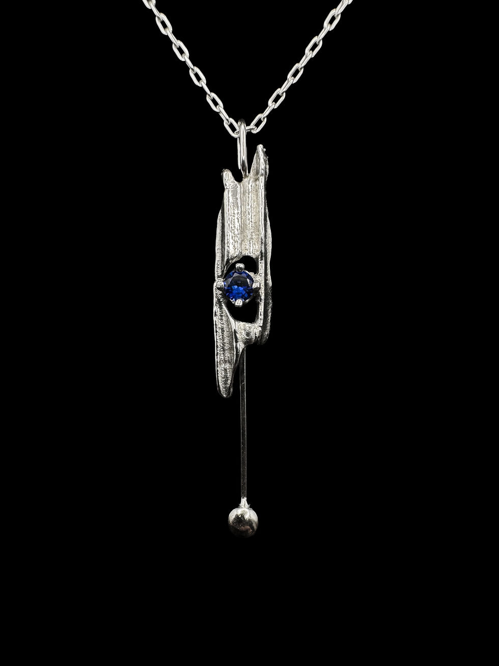 Spaghetti Cast Silver Pendant with Framed Sapphire