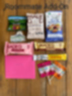 Thumbnail: organic snack items with a thank-you card included in the arrangement.