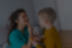 Speech-Language Therapist helping a child with their speech formation.