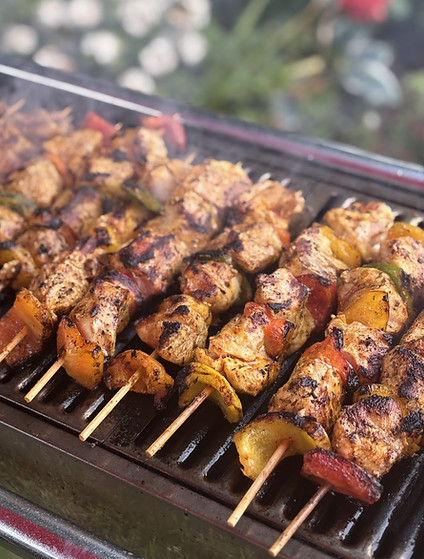 BBQ Chicken cooking on a bbq