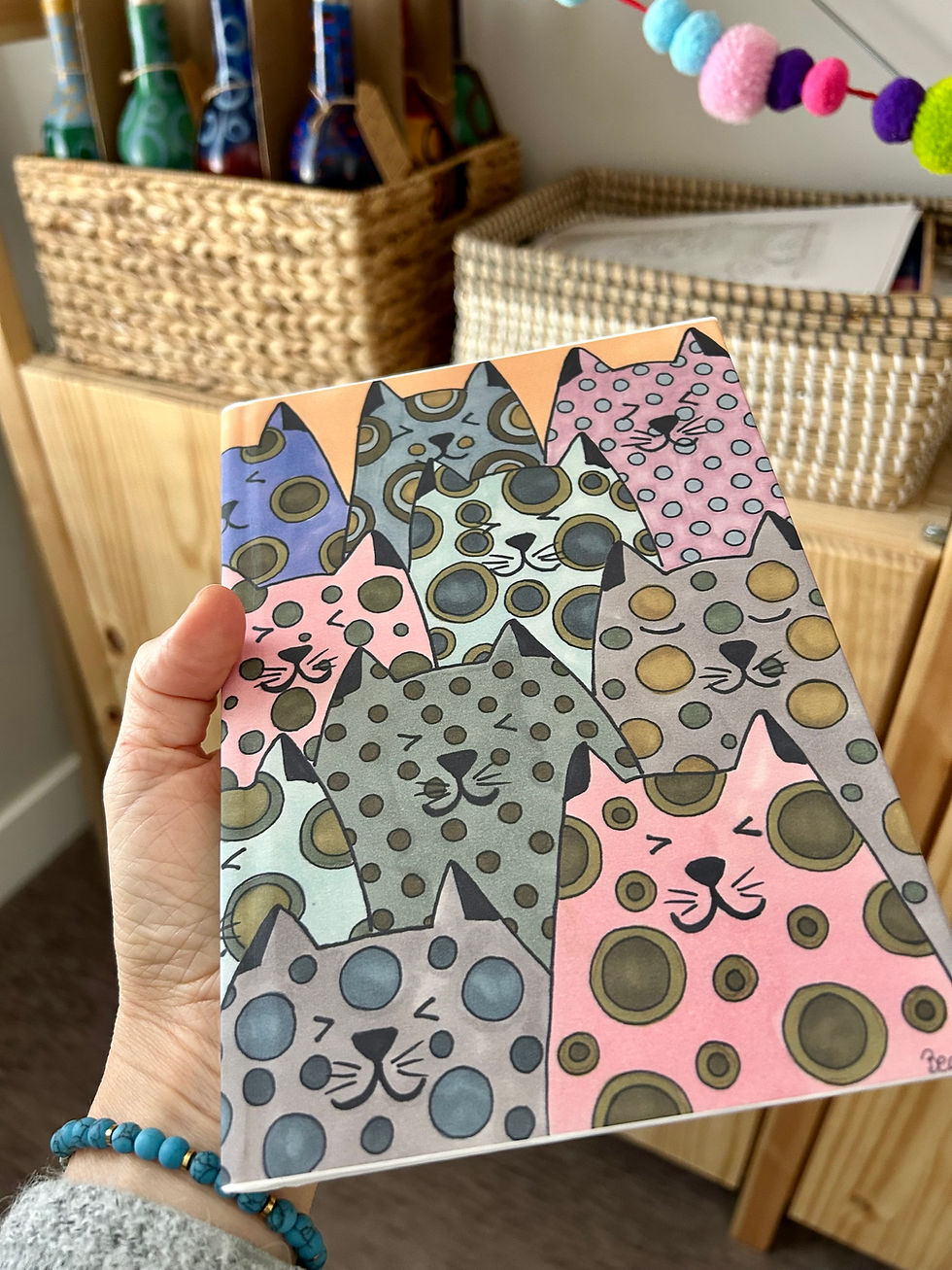 Pattern with cats in soft gray, blue, and pink tones by BeArt
