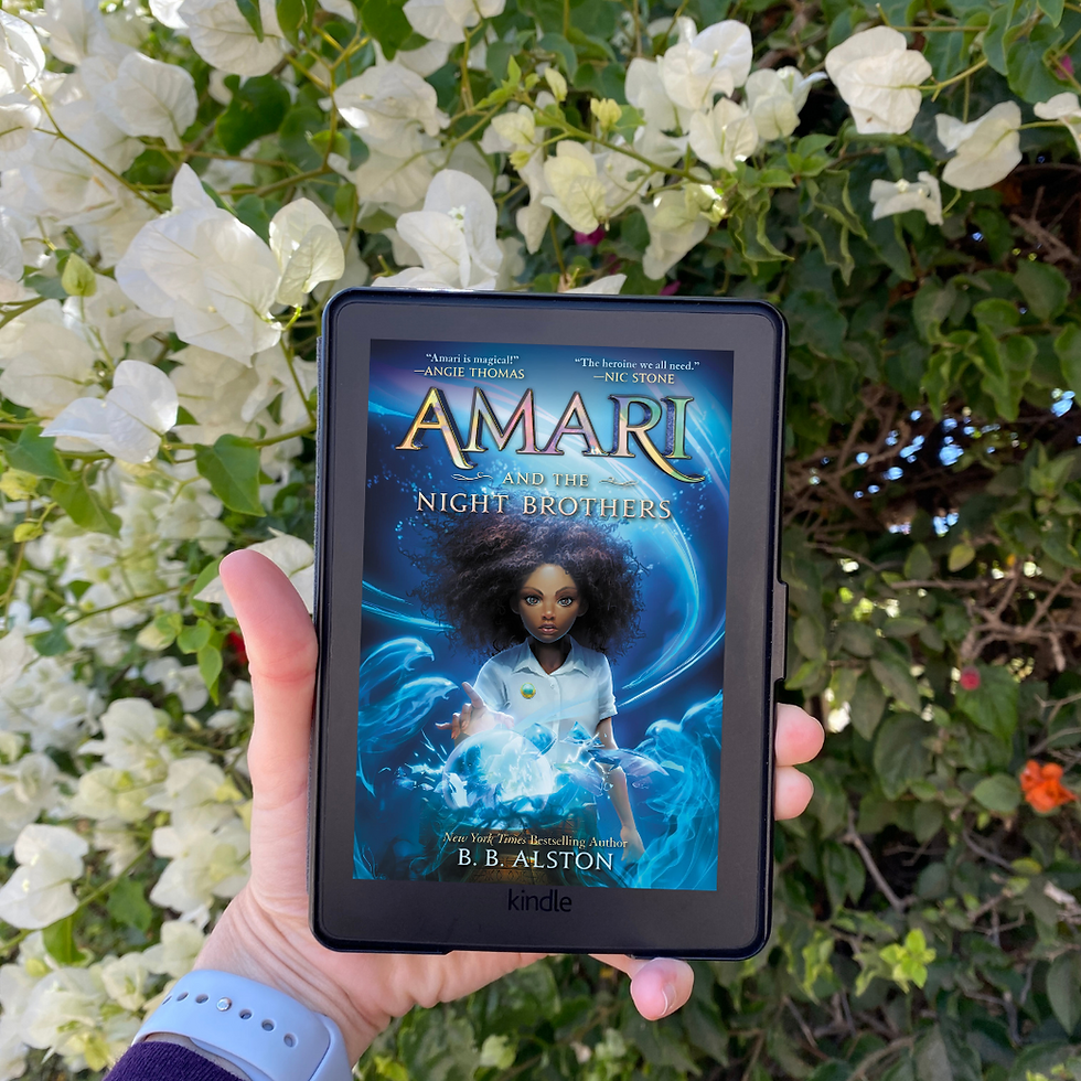 Book Cover of Amari and the Night Brothers by B. B. Alston above white flowers