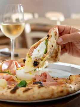 Authentic Italian pizza in Greenwich with fresh ingredients and a crispy wood-fired crust.
