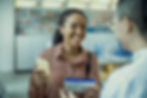 Woman at pharmacy counter