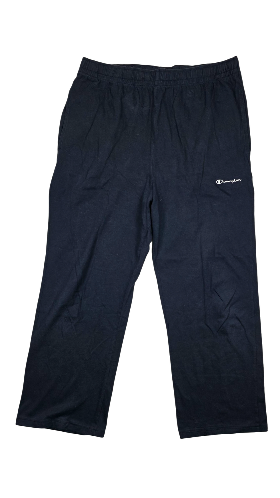 Pantalon Champion marine foncé, confortable et décontracté.