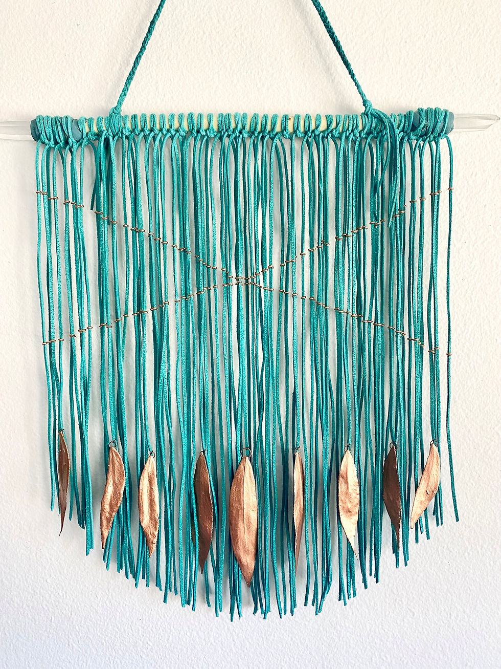 Thumbnail: Leather wall hanging with copper leafs and lemurian quartz