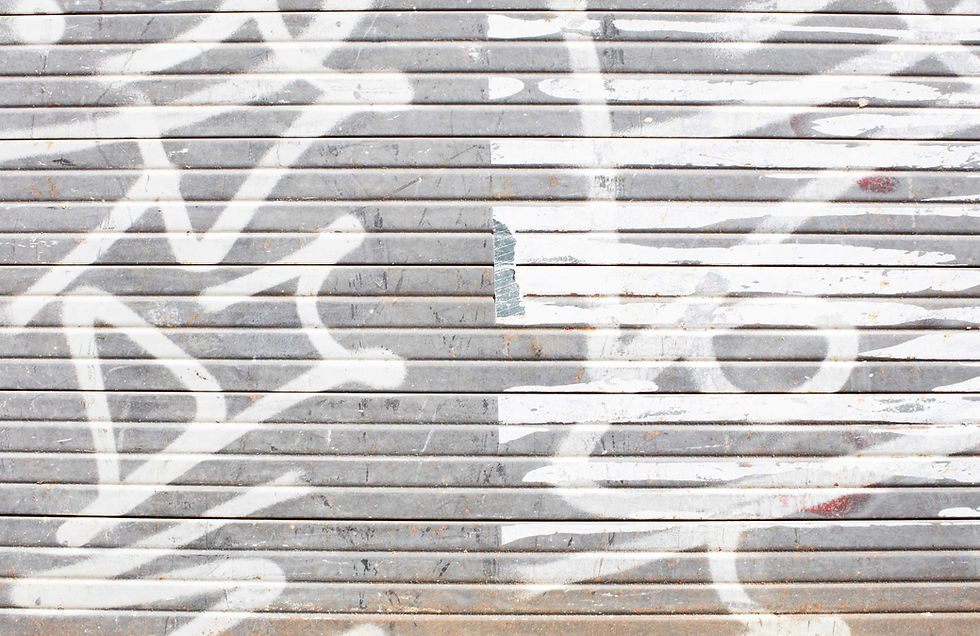 wall-with-white-graffiti.jpg