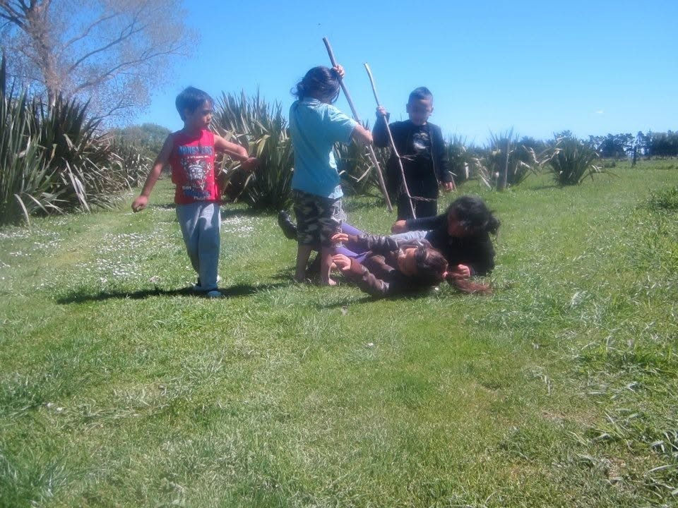 Me and my cousins pretending to be in a war