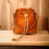 Thumbnail: Marcia Drawstring Bucket Bag - Orange & Cream