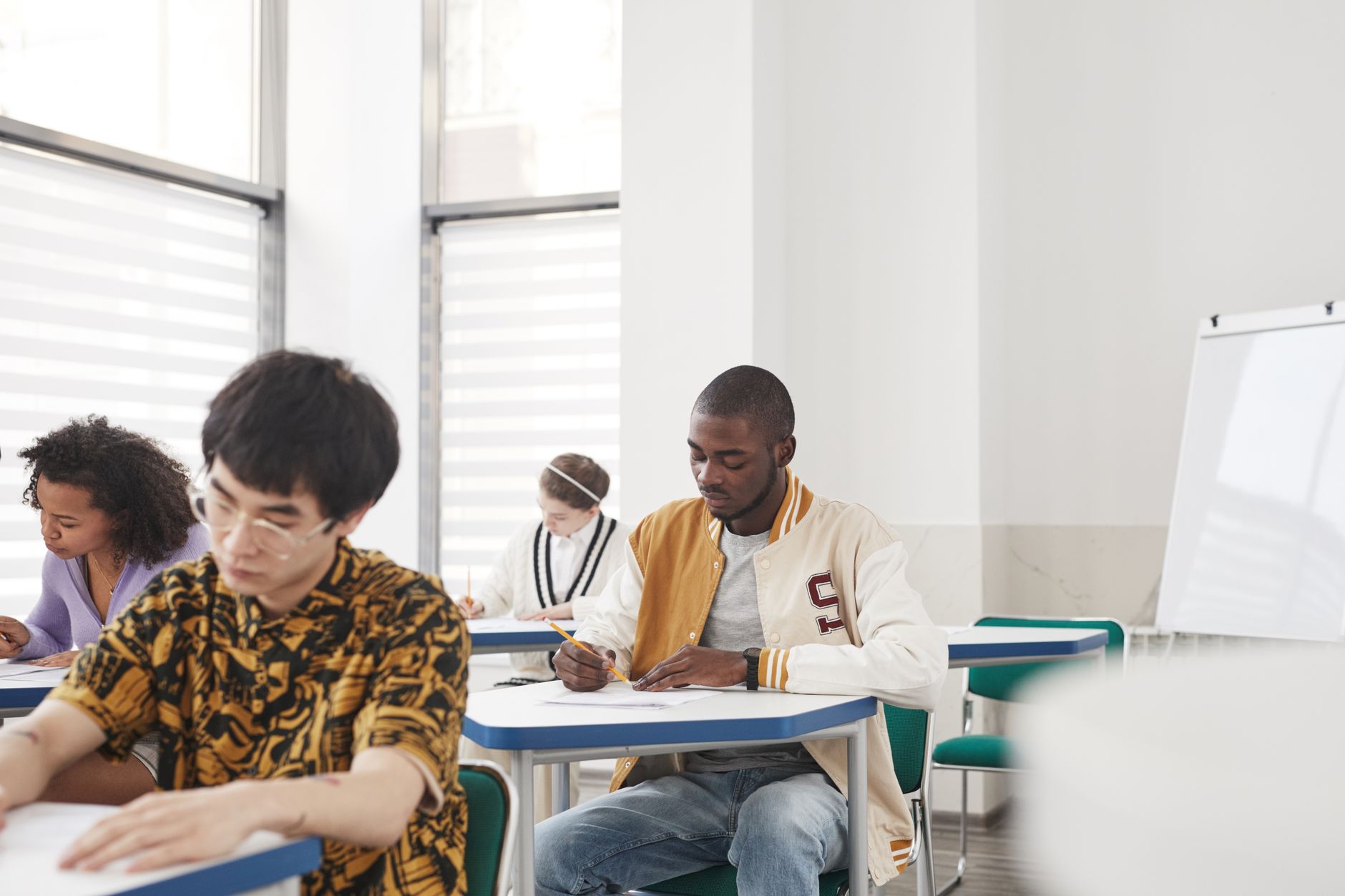 Student reviewing college admissions materials