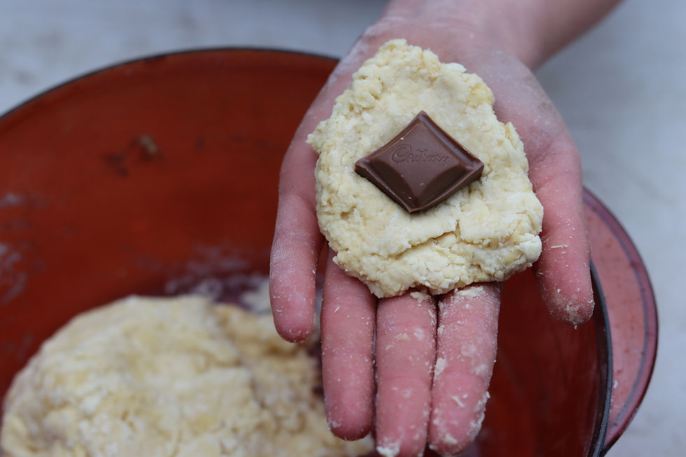 Adding the secret ingredient to the sweet dumplings