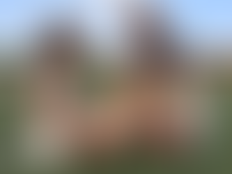 Athletic trainer helping an injured athlete