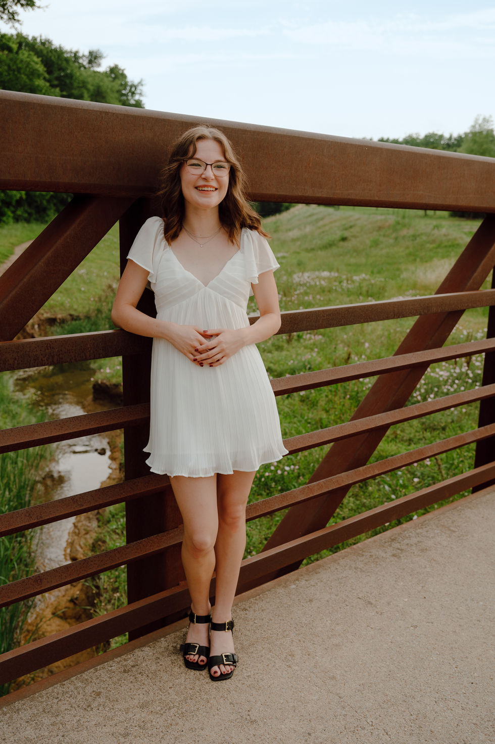 Girl's outdoor Senior Photography Dallas Fort Worth on bridge