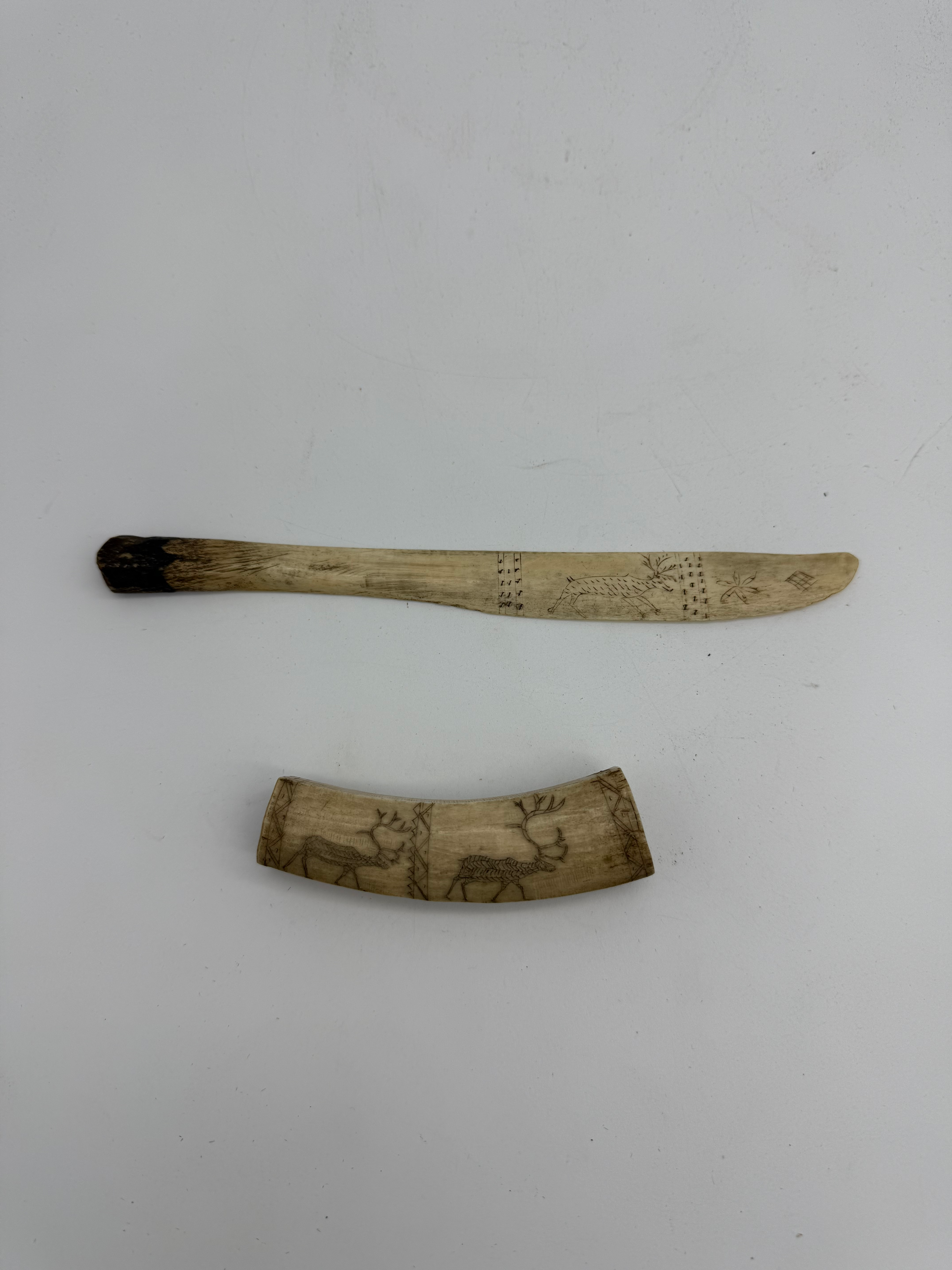 Two Eskimo bone objects engraved with deers