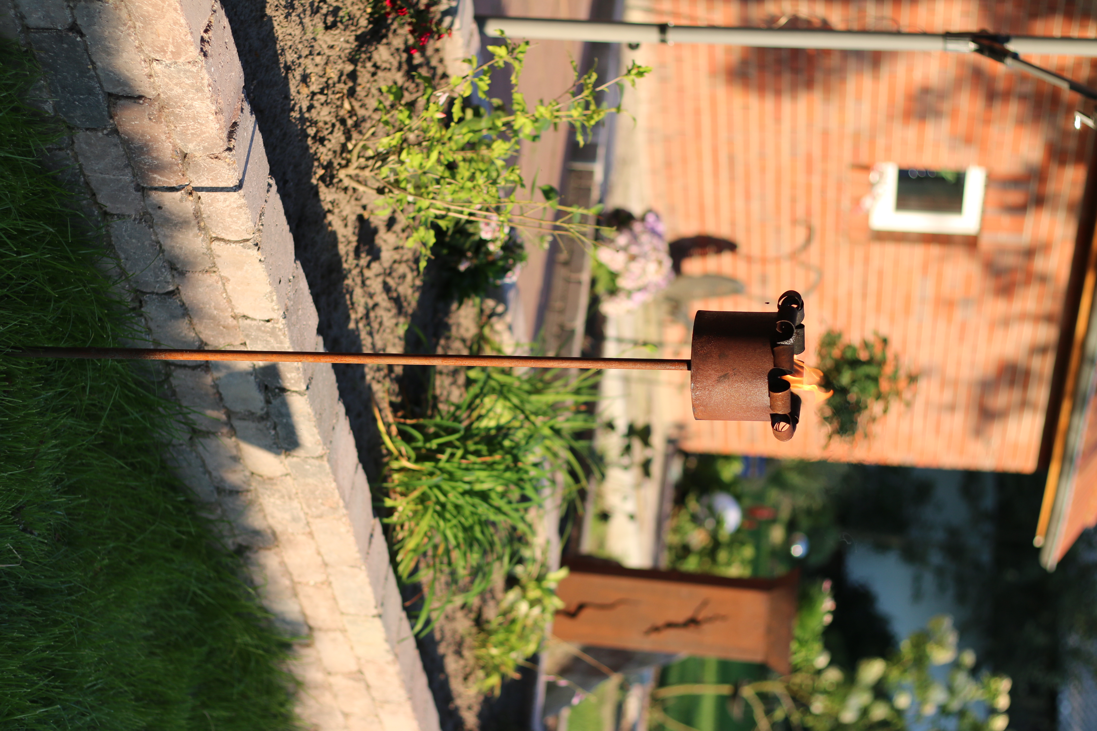 Gartenfackel Skulptur
