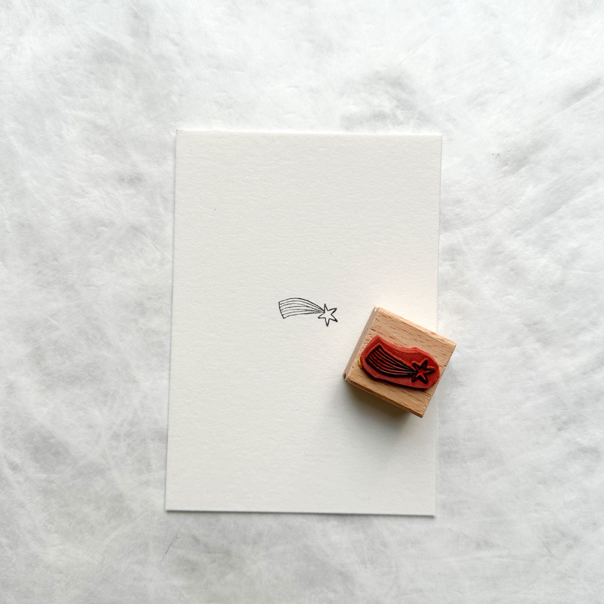 kerst . stempel 'vallende ster klein'