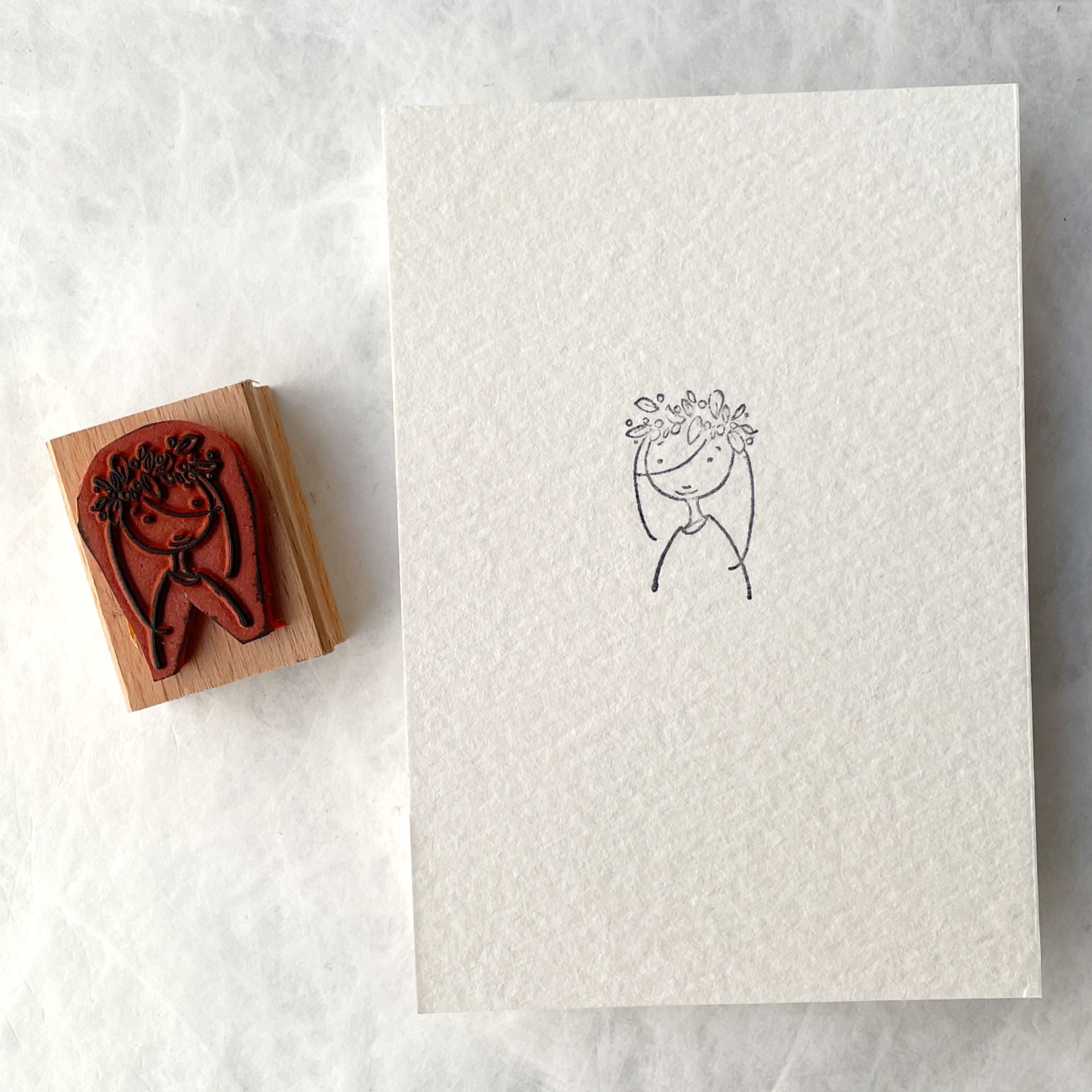 stempel 'meisje met krans'