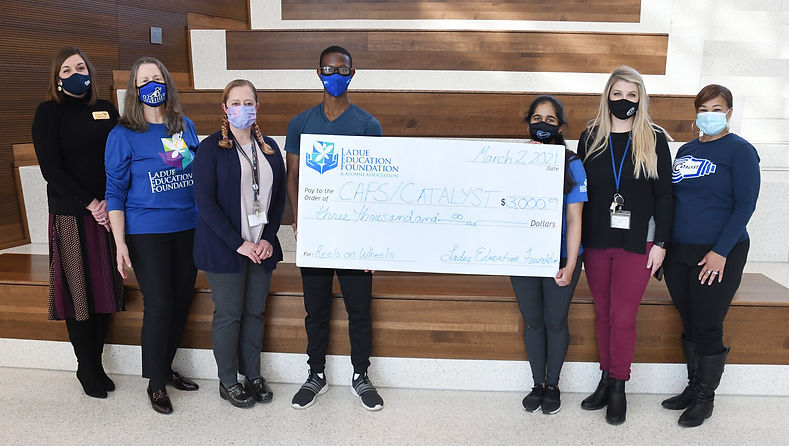 Big check for $3,000 for CAPS program from LEF presented to ladue high school
