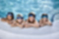 Children having fun in the swimming pool