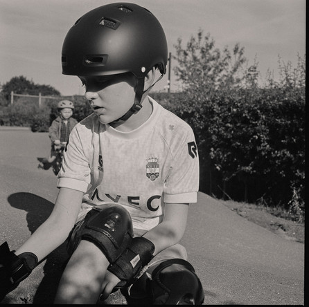 Analog photo of a boy skating