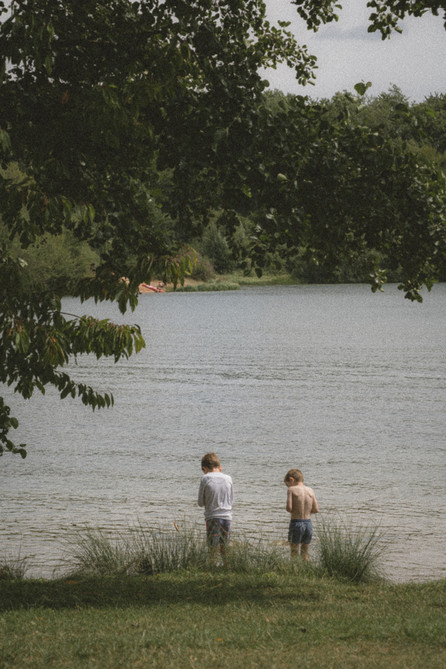 Analog photo of two kids at a lake