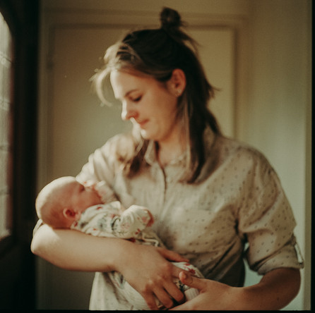 Analog photo of a mother and her newborn