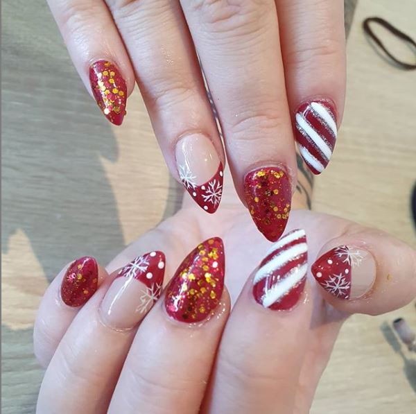 Christmas nails manicure with glitter stripes and french