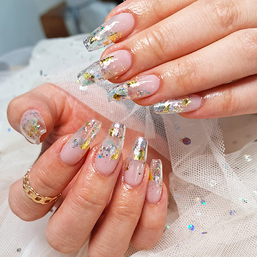 Glitter nail art on clear tips